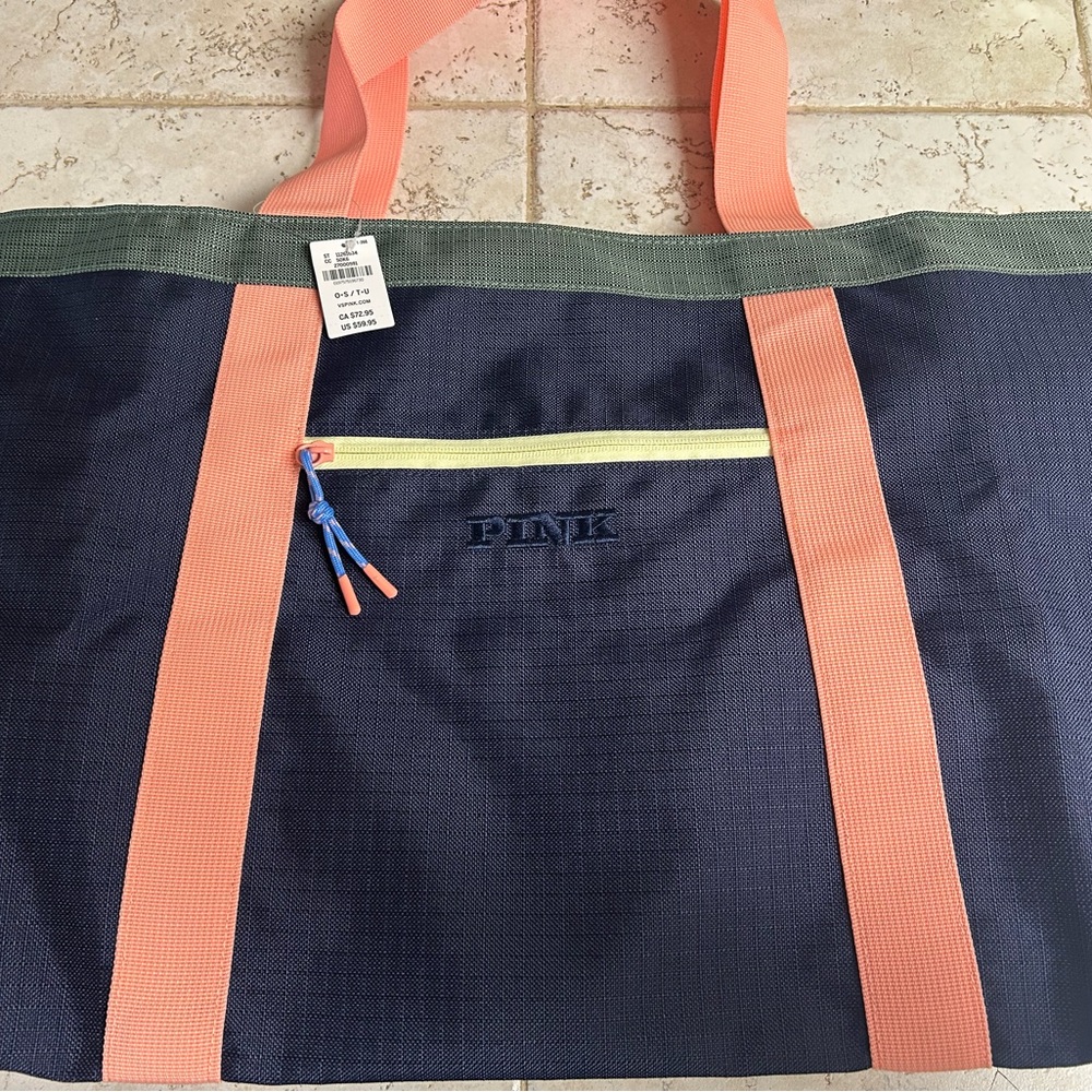 Pink Victoria’s Secret tote bag and beach towel